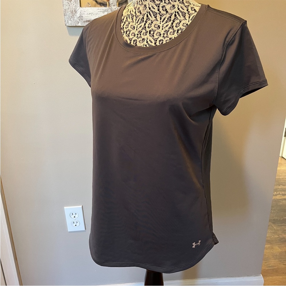 Under Armour shirt. Breathable fabric. No tags but it is a size L